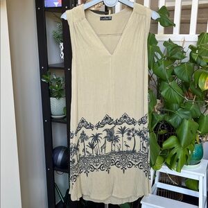 Beige Sleeveless Dress with Tropical Black Print